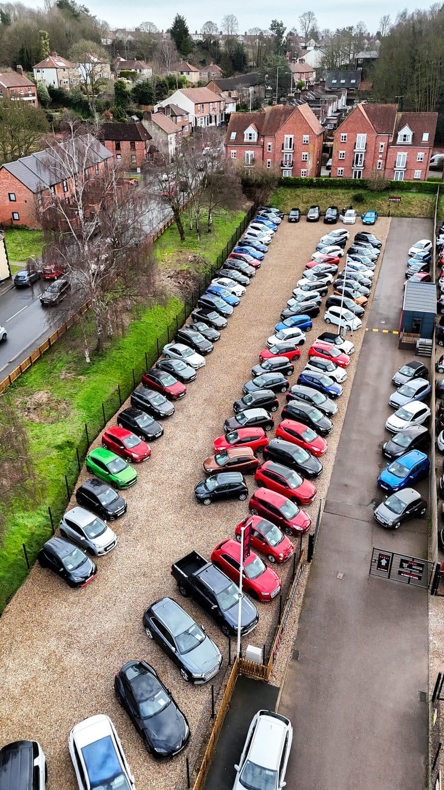 Aerial view of the BMC Group forecourt in Brooke, Norfolk, full of used cars